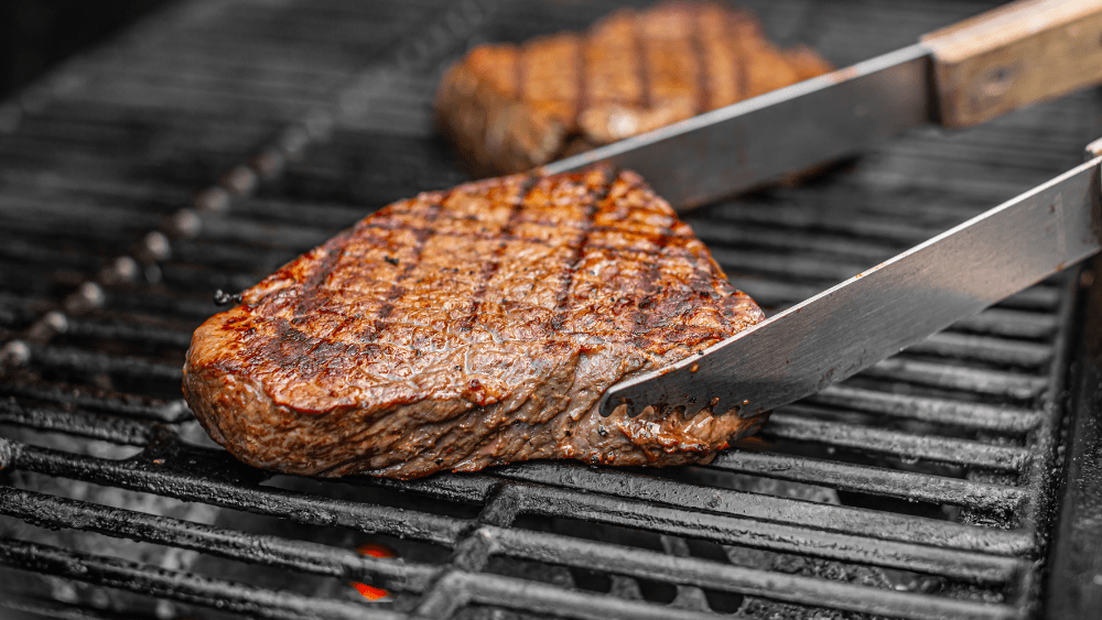 Cooking steak with gas.