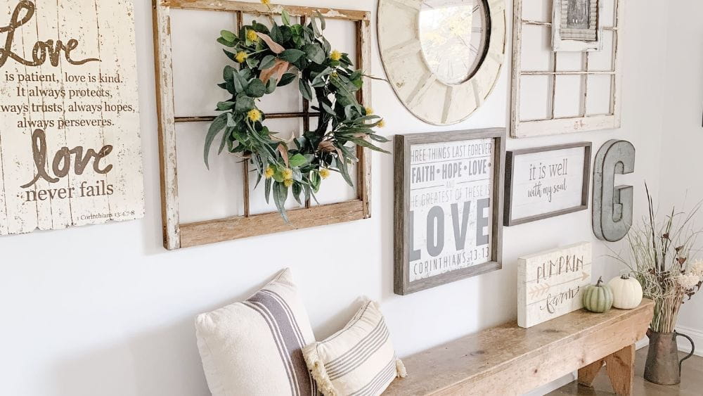 Wall covered in homely artwork.