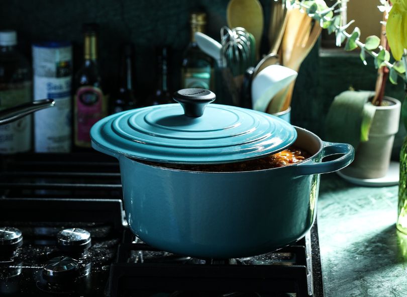 Casserole dish on a gas stove top.
