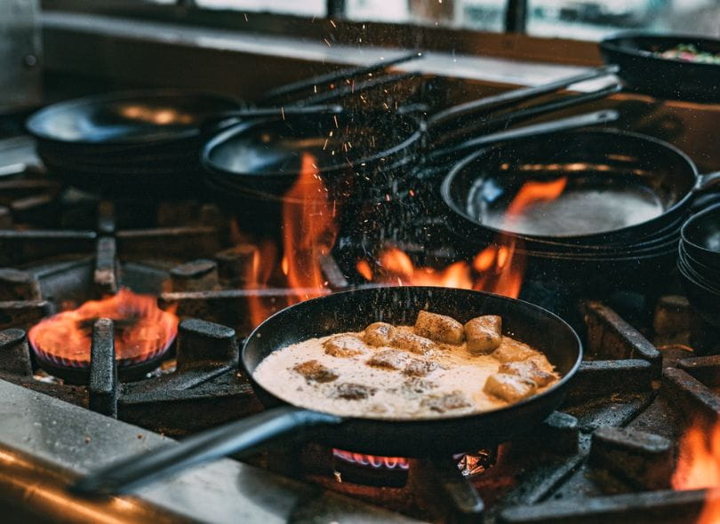 Blue Cheese Gnocchi recipe being cooked over gas at Social Kitchen.