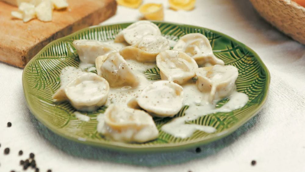 Creamy tortellini pasta ready to eat.