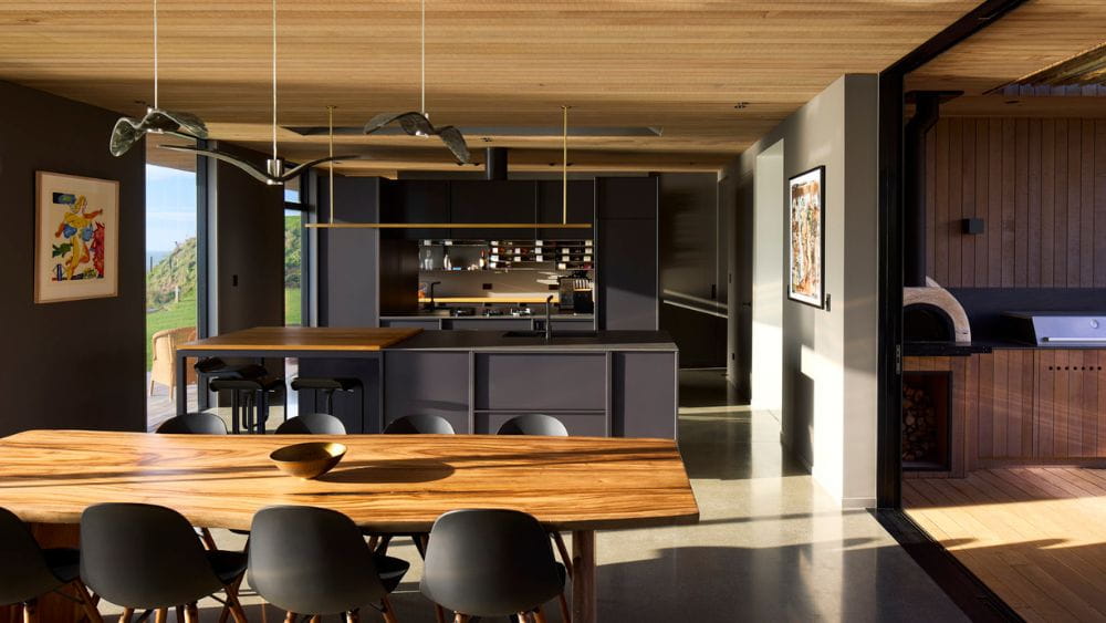 Sun drenched kitchen with gas stove top in Taranaki.