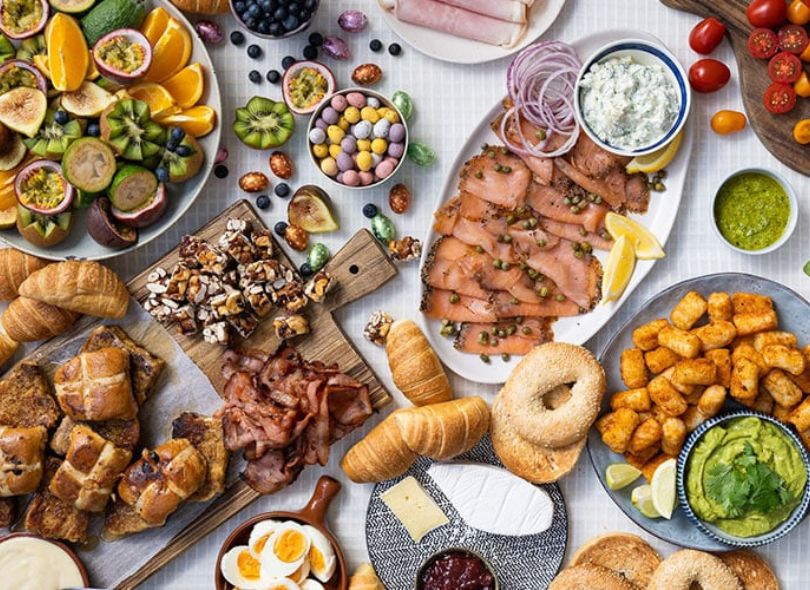 Delicious brunch platter spread out on table.