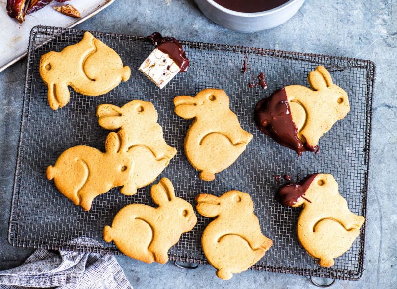 Bunny shaped biscuits dipped in chocolate.