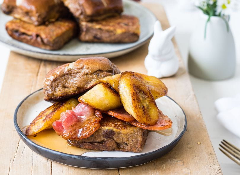 Hot cross buns as French toast with banana and bacon.