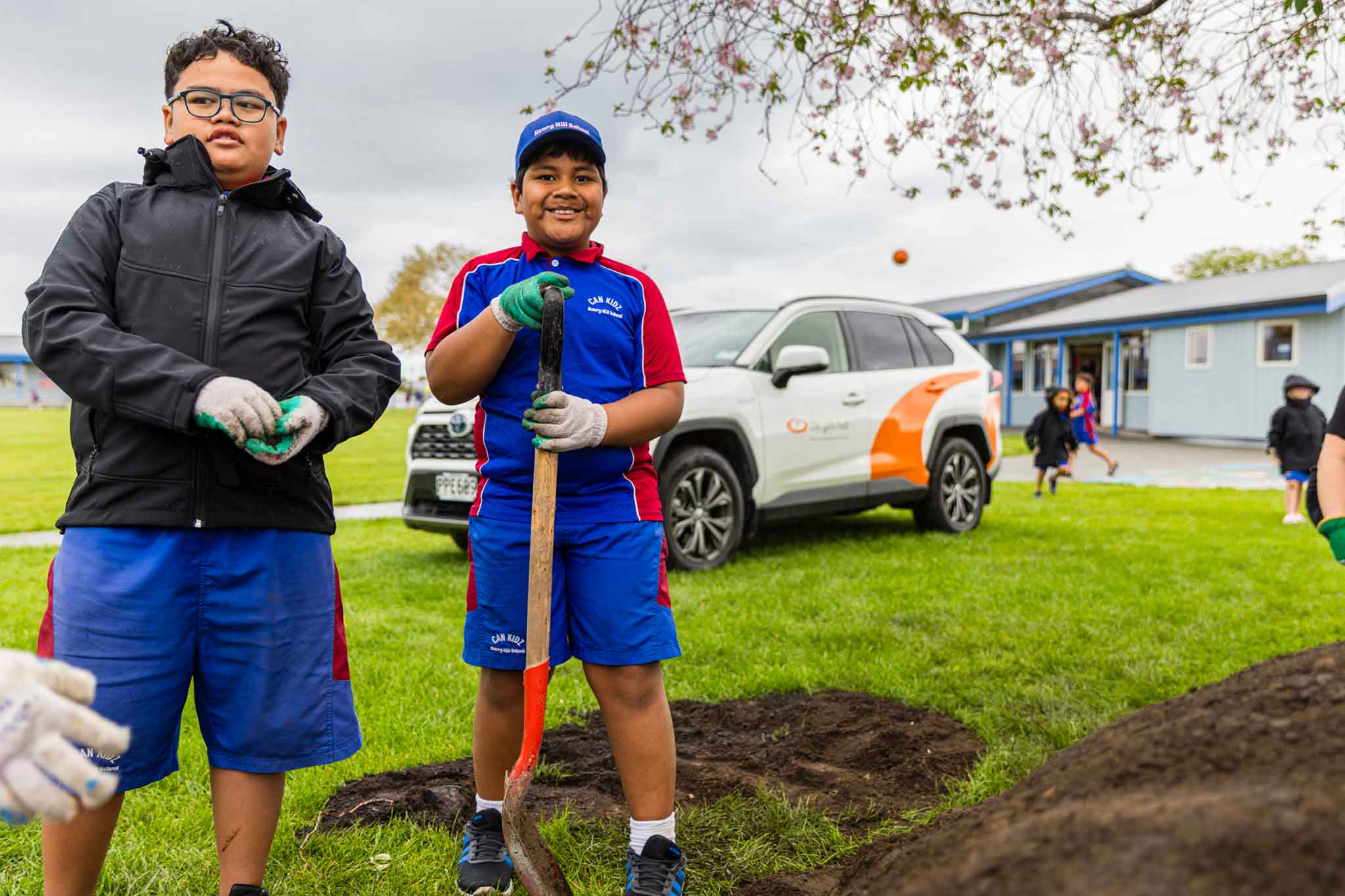 children planting vegetables at school