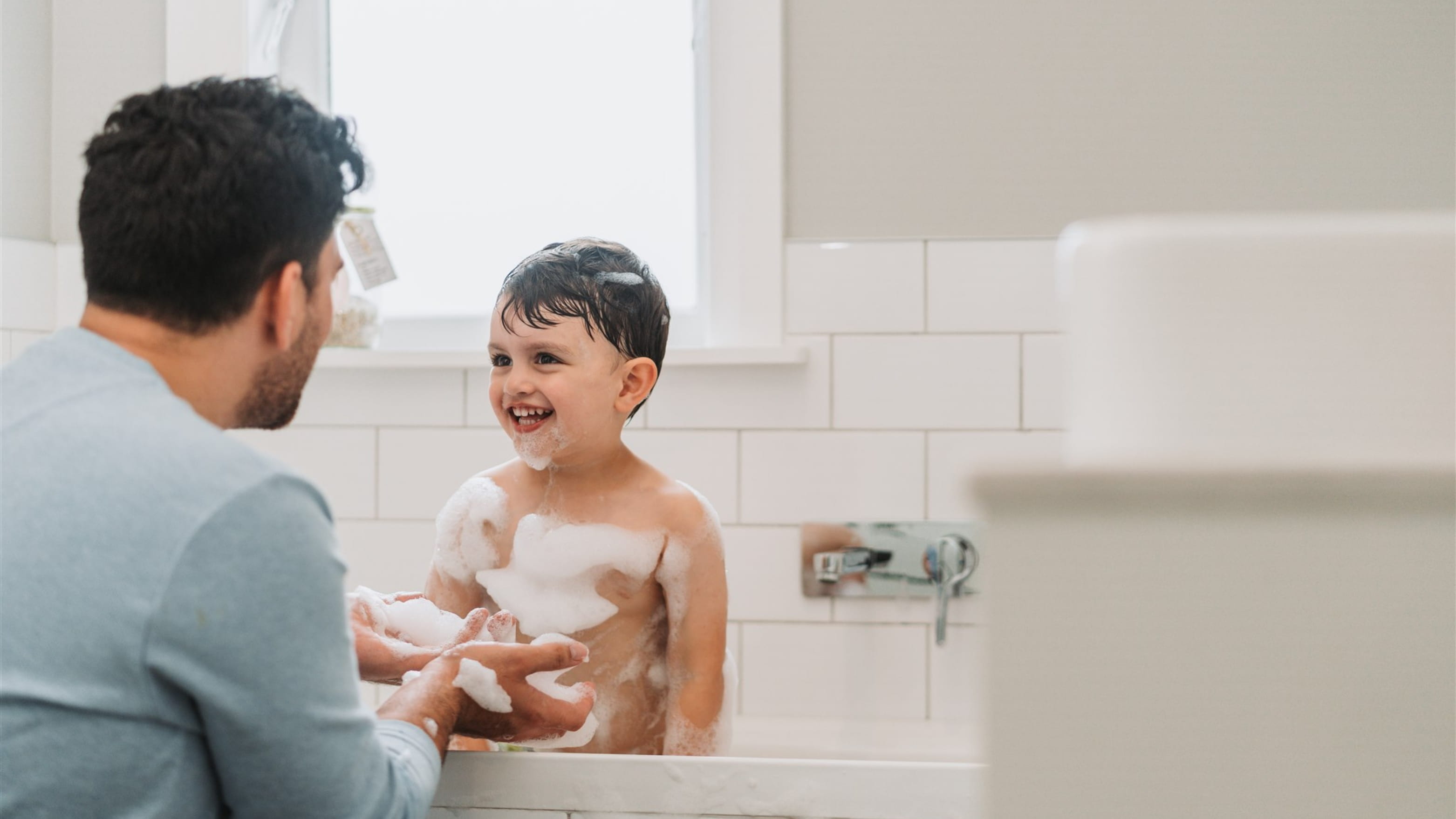 Boy in bath.