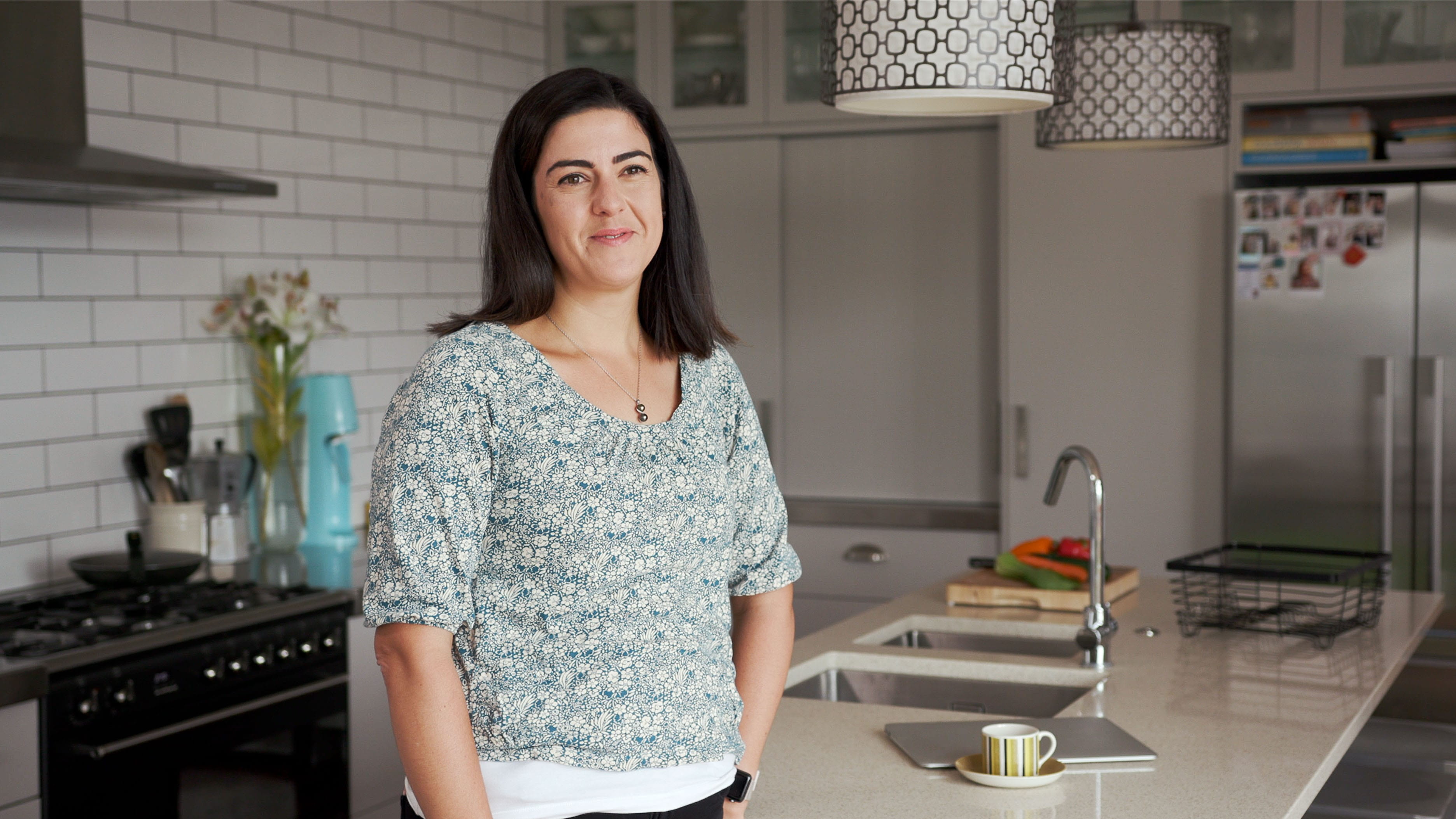 Jen in kitchen connecting to gas