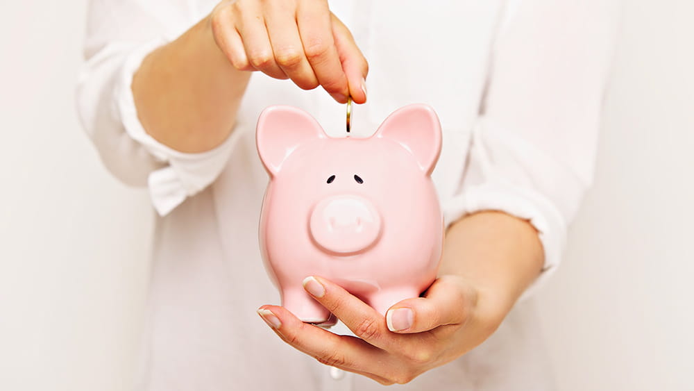 Woman with piggy bank